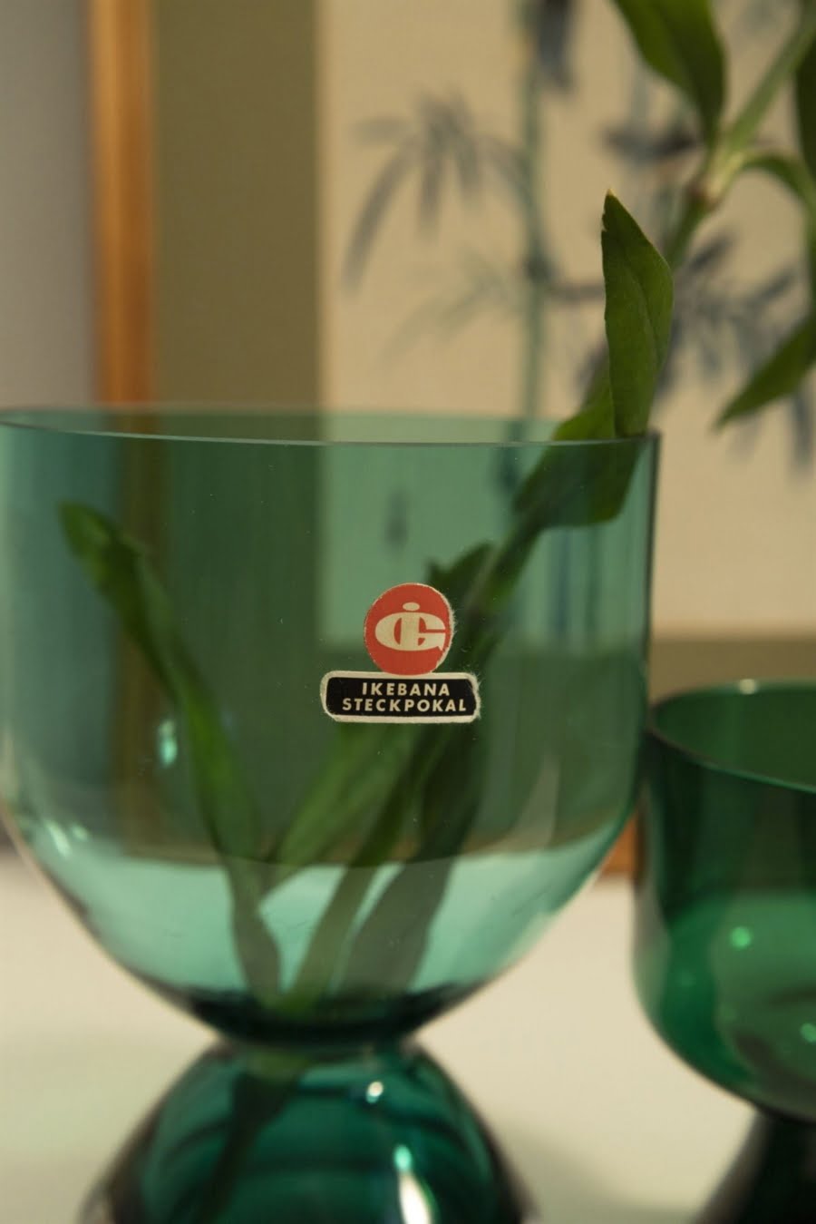 Set of two green Ikebana vases