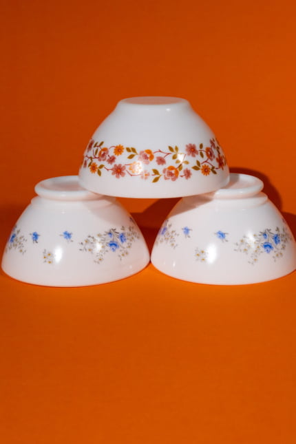 Vintage Arcopal set of three floral pattern bowls