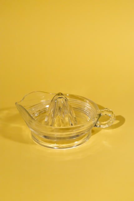 Vintage glass lemon squeezer