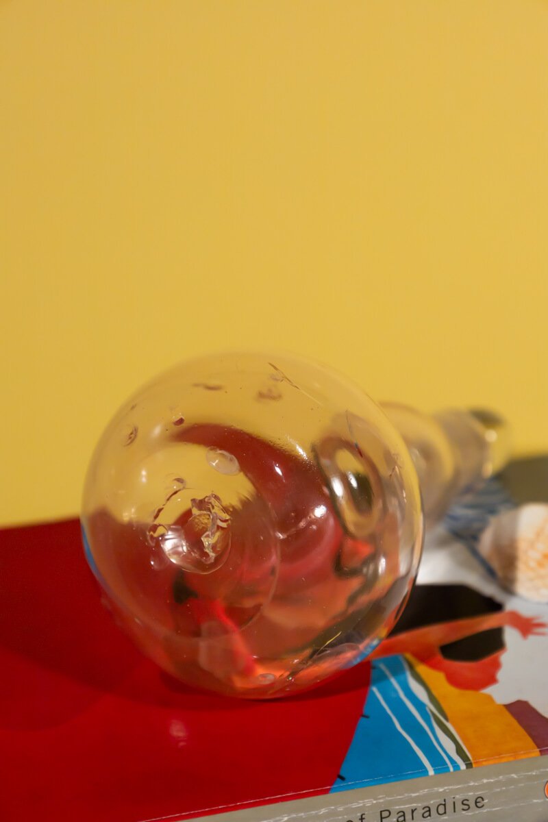 Vintage light pink decorative glass bottle