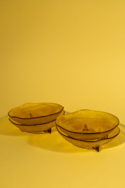 Vintage set of four amber glass bowls