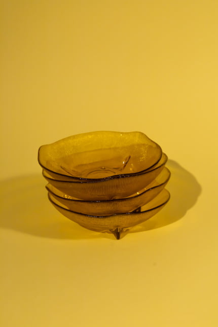 Vintage set of four amber glass bowls