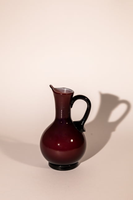 Vintage burgundy opaline pitcher